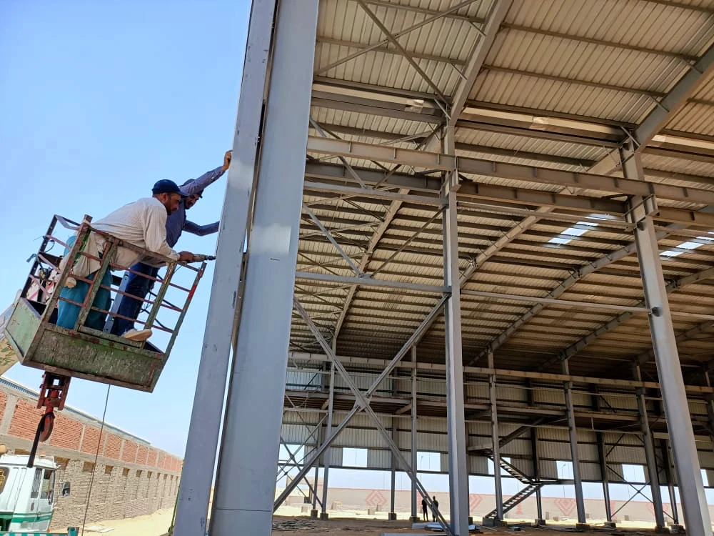 On-site steel installation work in Sadat City
